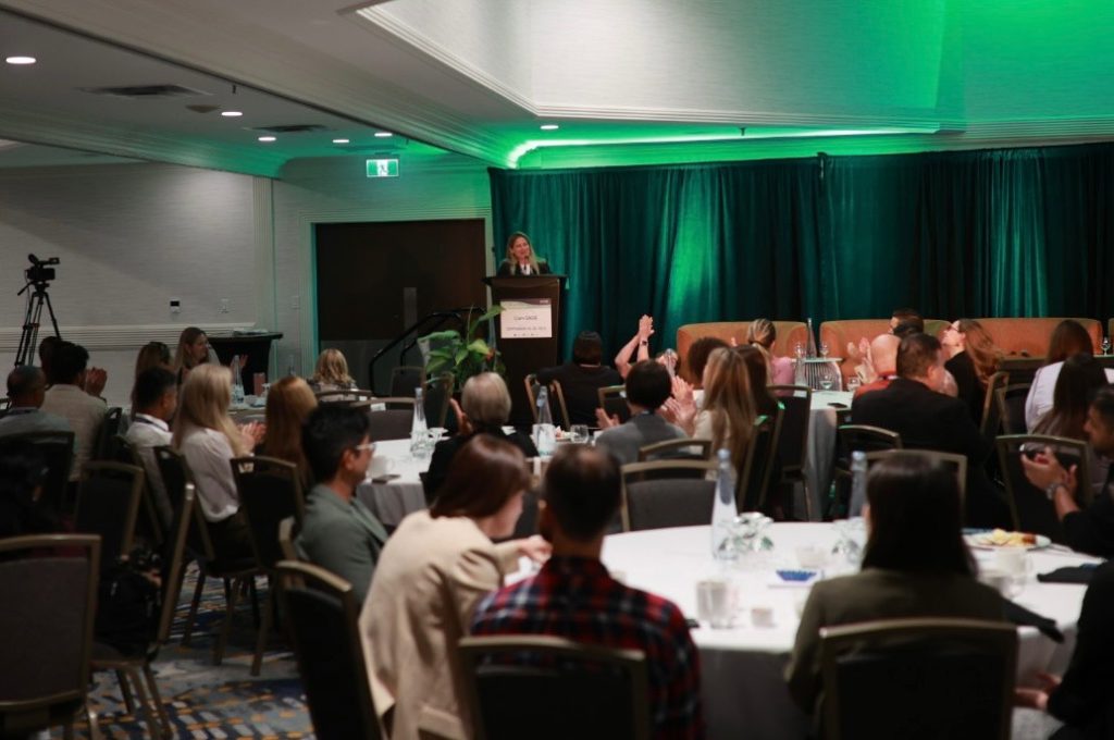 Jamie Kroft speaking at CanSAGE conference September 2025